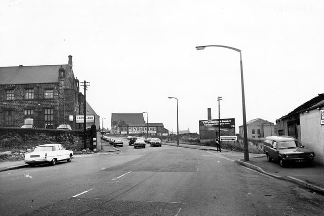 East Street in Cross Green in October 1978 showing the junction with Low Fold on the right. J. Boyd & Son Clothiers is on the left of the photo and Spen Tyres is in the background.