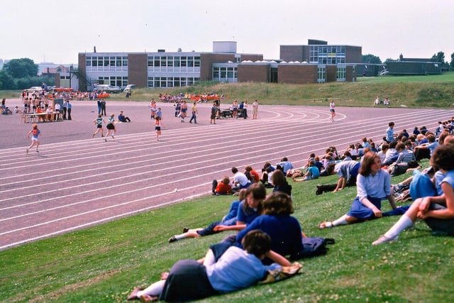 Sports Day is underway at Woodkirk Secondary School on Rein Road in July 1978. The all-weather track had recently been laid when this photo was taken. PIC: David Atkinson Archive