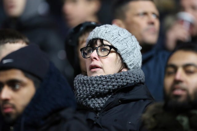 A North End fan watches the derby clash with Blackburn