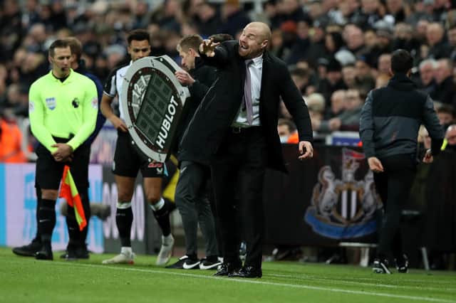Sean Dyche, Manager of Burnley gives his side instructions during the Premier League match between Newcastle United and Burnley at St. James Park on December 04, 2021 in Newcastle upon Tyne, England.