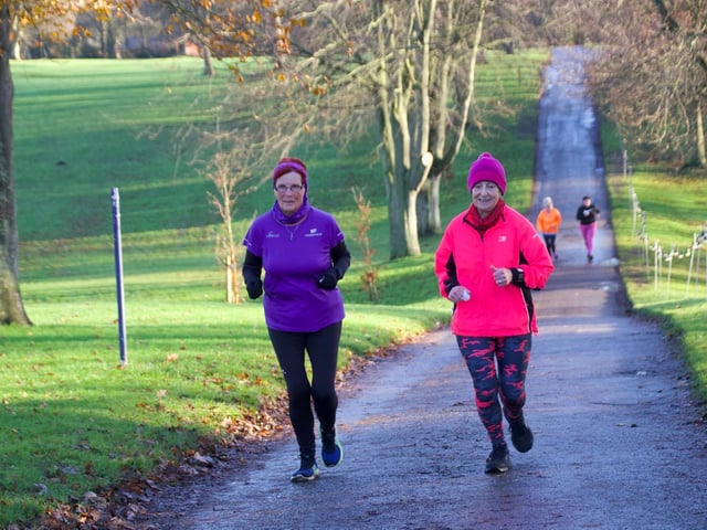 A pair of runners dig deep during the hilly section at Sewerby Parkrun
Photos by TCF Photography