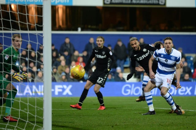 Kemar Roofe scores the opening goal of the game at Loftus Road.