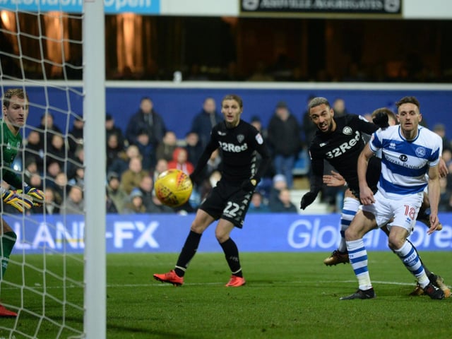 Kemar Roofe scores the opening goal of the game at Loftus Road.