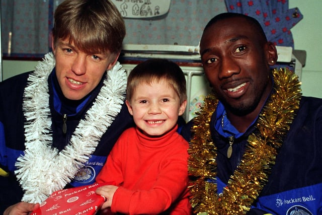 Patient Adam Sharp met Leeds United stars Gunnar Halle and Jimmy Floyd Hasselbaink at St James's Hospital.