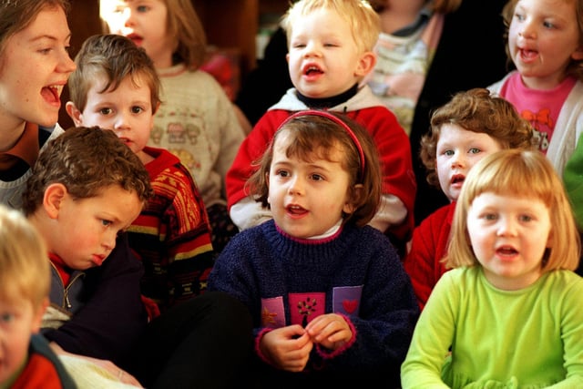 Olivia Hester (centre) from the Little People Private Day Nursery in Stanningley is pictured among other children at Farsley Library singing Christmas carols.