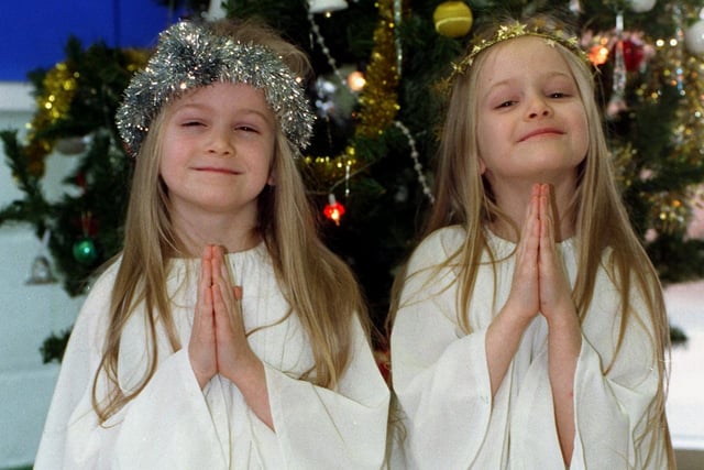 Twins  Sian and Rhian Lukes from Holy Family RC  Primary School, Blackpool, praying for Christmas, 1997