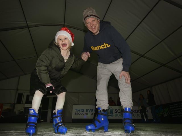 Daughter and dad having festive fun.