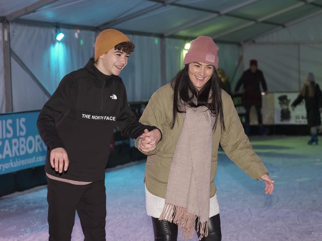 Family fun on the ice ... steady does it!