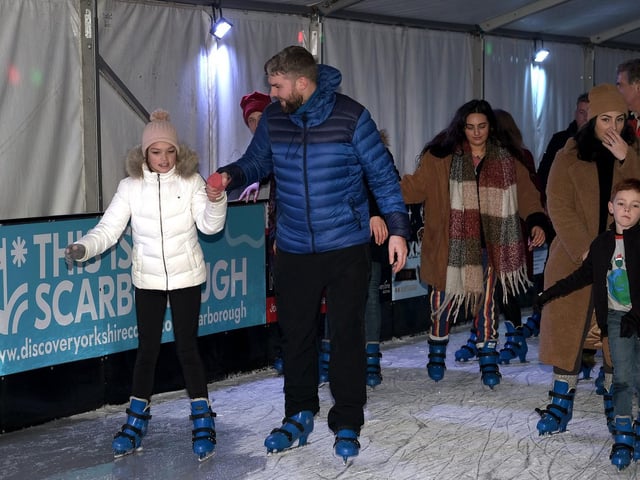 Family fun on the ice ... steady does it!