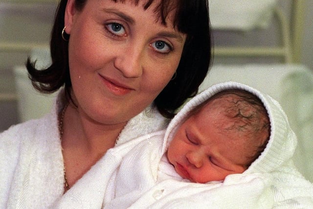 Elizabeth Butterill is picturted with baby Chloe who was born at 2.05am on Christmas Day, weighing 7lb 12oz.