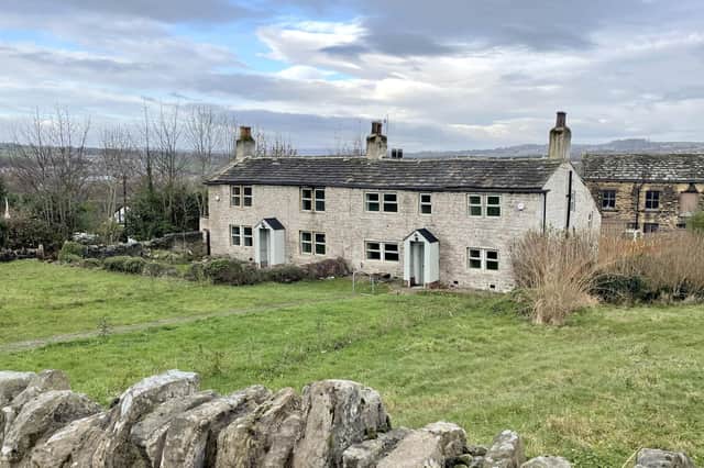 Two recently refurbished 18th century cottages with amazing views across the west Leeds greenbelt are for sale with Manning Stainton.