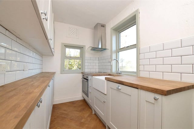 The kitchen is a galley-style and done to a modern specification, with contemporary worktops. The sink is also next to the window, giving you great countryside views while you wash up.