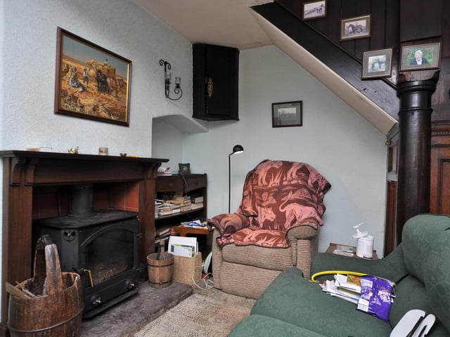 A lovely feature fireplace within the sitting room of the property.