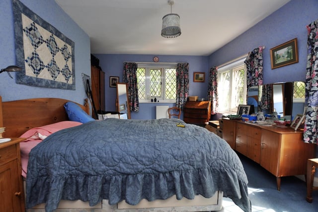 A double bedroom within the house has plenty of natural light.