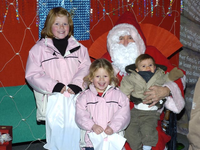 Children visit Santa’s Grotto at the Tourist Information Centre, in aid of the RNLI.