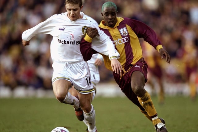 Stephen McPhail holds off Bradford City's Jamie Lawrence during the Premiership clash at Valley Parade in March 2000.