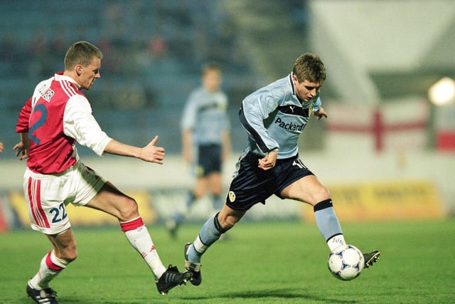Stephen McPhail is tracked by Slavia Prague's Libor Koller during the UEFA Cup quarter-final second leg at Strahov Stadium in March 2000.