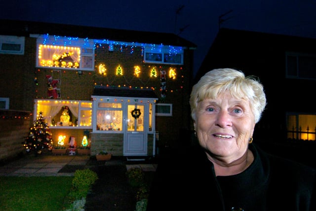 This is Margo Gill showing off her Christmas lights at her Swarcliffe house in December 2009.