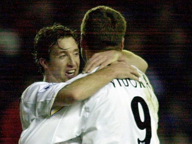 Robbie Fowler congratulates Mark Viduka after the Aussie opened the scoring.
