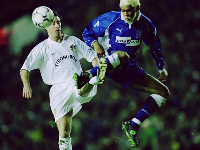 Robbie Fowler is challenged by Everton's Abel Xavier.