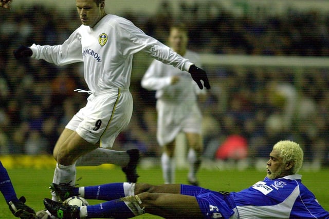 Mark Viduka is stopped in his tracks by Everton's Abel Xavier.