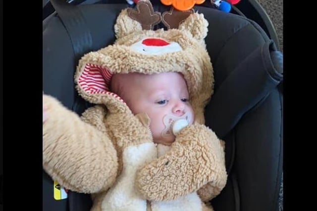 Aleks Stolarska shared a photo of her 2 month old in his reindeer suit.