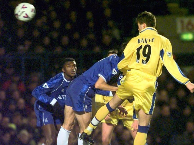 Eirik Bakke rises high above the Chelsea defence to get in a header.