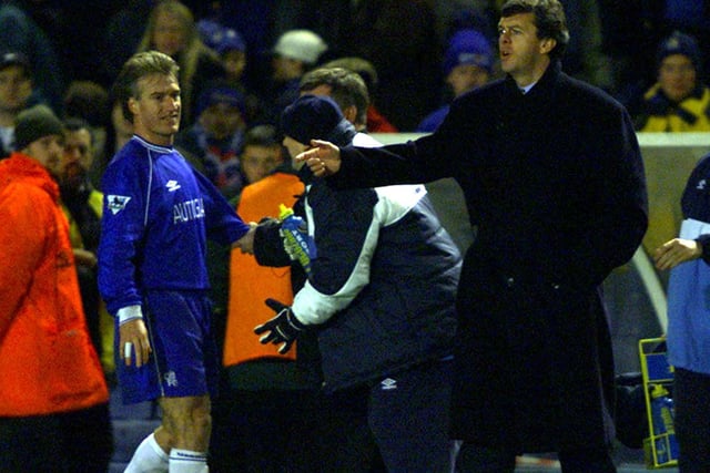 Chelsea's Didier Deschamps is keen to make his point to Leeds manager David O'Leary.