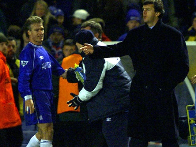 Chelsea's Didier Deschamps is keen to make his point to Leeds manager David O'Leary.