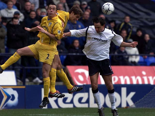 Gary Kelly and Jonathan Woodgate go up for a header with Bolton Wanderers striker Dean Holdsworth.