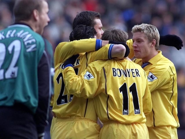 Robbie Fowler (left) celebrates opening the scoring against Bolton, with teammates Lee Bowyer and Alan Smith (right). PIC: Gareth Copley/PA