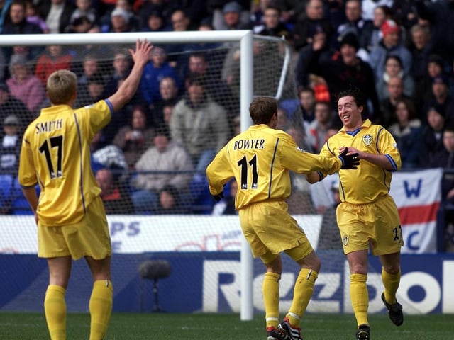 Lee Bowyer is the first to congratulate Robbie Fowler after the striker scored his second goal of the game.