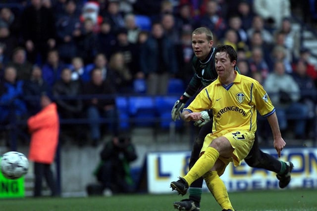 Robbie Fowler completes his hat-trick after scoring his third goal past Bolton Wanderers goalkeeper Jussi Jaaskelainen.