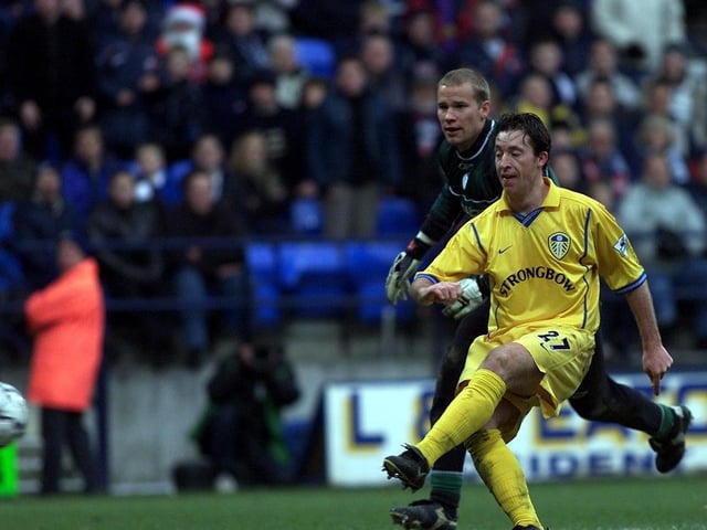 Robbie Fowler completes his hat-trick after scoring his third goal past Bolton Wanderers goalkeeper Jussi Jaaskelainen.