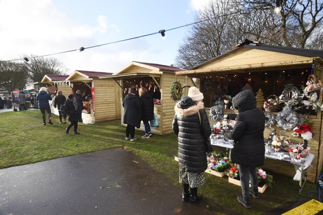 Cabins at the market feature a wide range of festive goodies