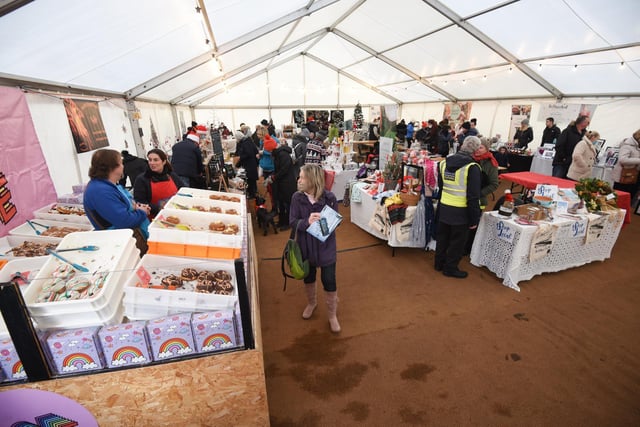 A marquee features a wide variety of stalls.