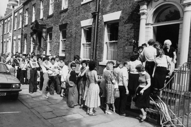 Hundreds of people queued at the Leeds Immunisation Centre on Park Square for cholera jabs in August 1979 after an outbreak in Spain.