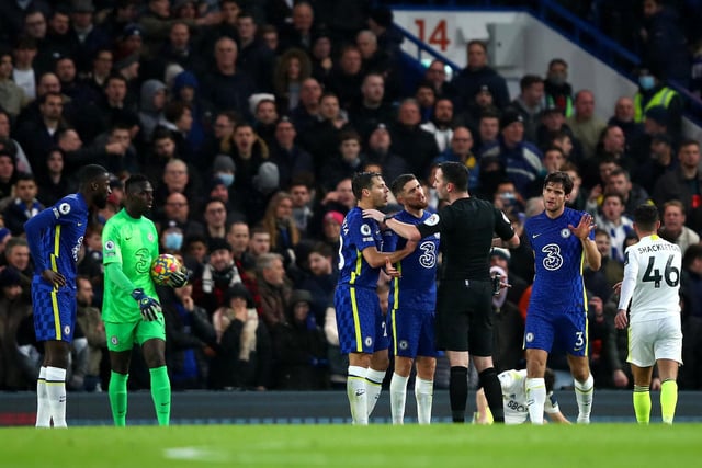 6 - Used his cards liberally, too liberally on occasion. Needed VAR help for Chelsea's second penalty. Struggled to keep a lid on the tension at the end.
Photo by Marc Atkins/Getty Images.