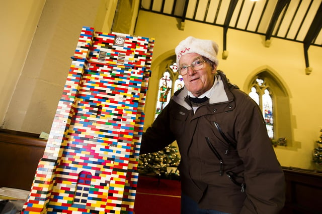 Mytholmroyd Christmas Tree Festival at St Michael's Parish Church. Wilf Franklin with his Lego scale model of the church tower, fundraising to repair the real church tower.