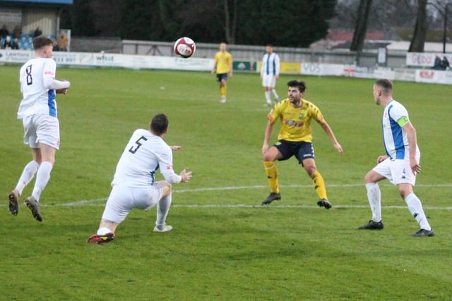 Liversedge players surround this Tadcaster Albion player. Picture: Keith Handley