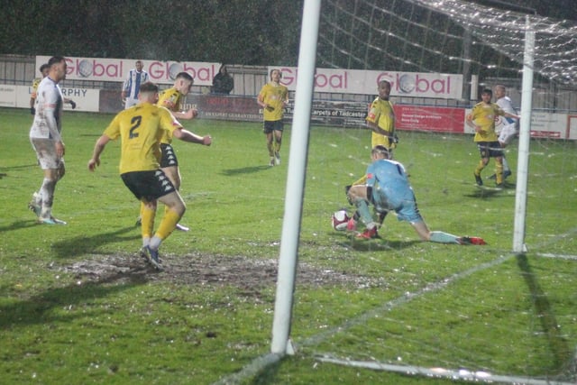 Tadcaster Albion goalkeeper Ben Bottomley gets down to save. Picture: Keith Handley