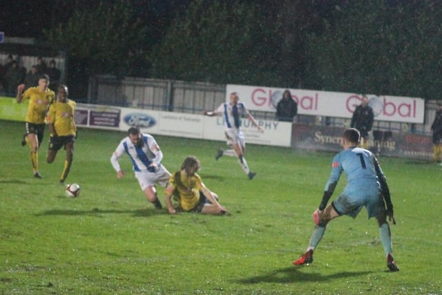 A Tadcaster Albion defender makes a risky challenge. Picture: Keith Handley