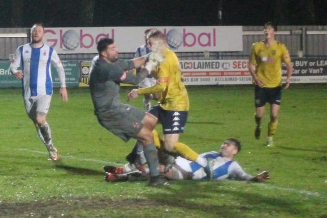 Goalkeeper Jordan Porter is out to the edge of his area to deny a Tadcaster Albion attacker. Picture: Keith Handley
