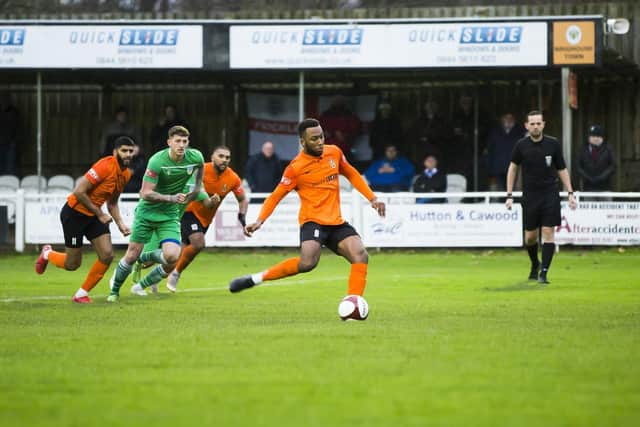 Laurence Sorhaindo scores from the spot for Brighouse Town against Frickley Athletic. Picture: Jim Fitton