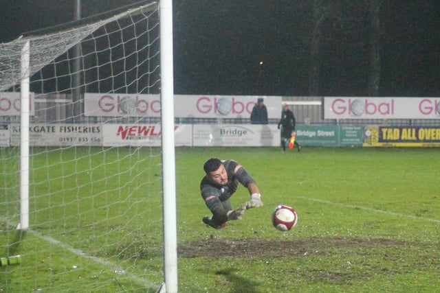 Liversedge goalkeeper Jordan Porter gets down well to make a vital save in his side's 2-0 victory. Picture: Keith Handley