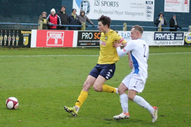 Liversedge right-back Jacko Hardacre stays close to a Tadcaster attacker. Picture: Keith Handley