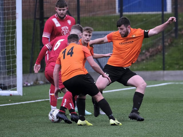 Edgehill skipper Joe Gallagher gets stuck in v Newlands
