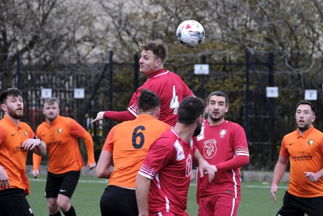 Newlands midfielder Ben Luntley, who impressed throughout the match, wins a header in the Scarborough Saturday League first division 3-1 win at Edgehill.

Photos by Richard Ponter