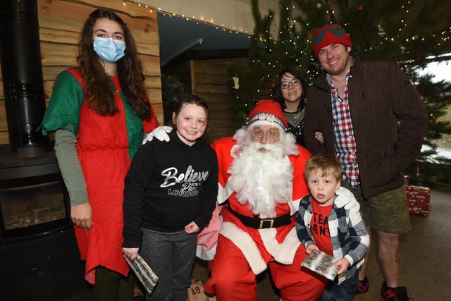 Santa meets parents and children at the Christmas event.