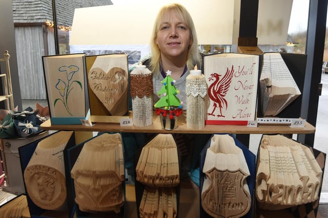 Nikki Parsons  of Nikki's Book Folding Frenzy on her stall at the Christmas markets